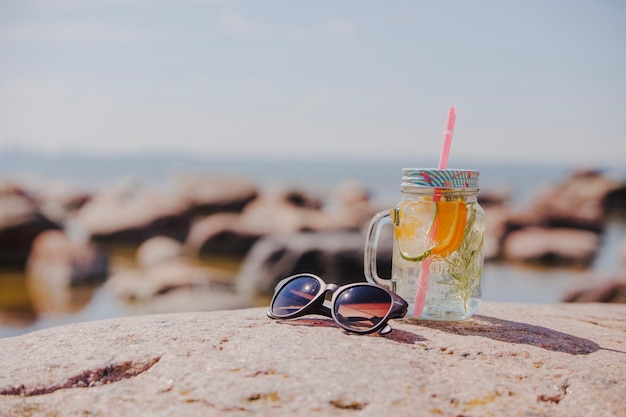 Sunglasses with refreshing drink