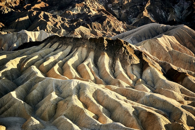 Free photo sunny scenery of the zabriskie point in death valley national park, california - usa