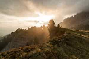 Free photo sunrise above mountain