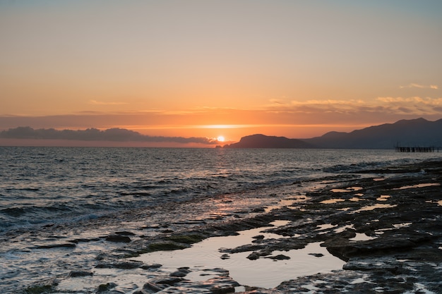 Free photo sunrise over the sea and beautiful seascape.