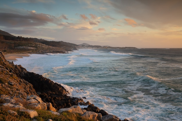 Free photo sunset at the sea in porto do son, galicia, spain