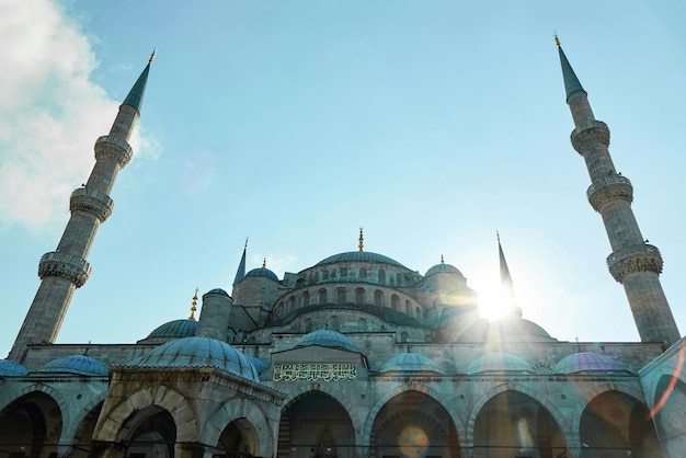 Free photo at sunset on the sky background blue mosque istanbul turkey