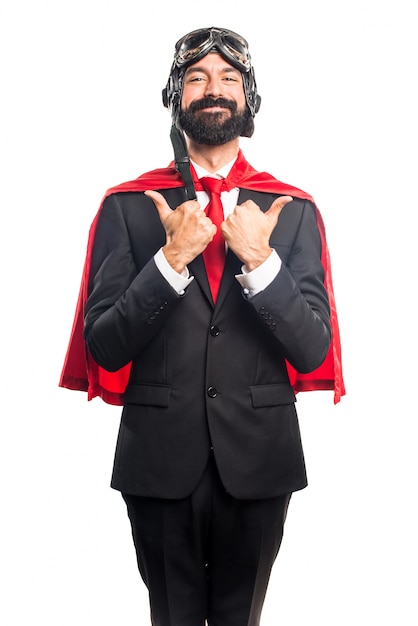 Free photo super hero businessman with thumb up