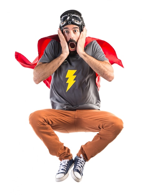 Free photo superhero doing surprise gesture