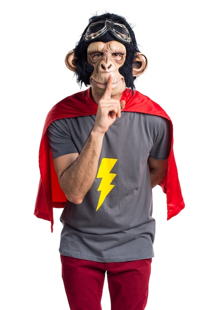 Free photo superhero monkey man making silence gesture