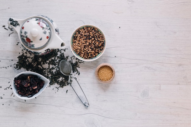 Supplies for tea brewing on white background