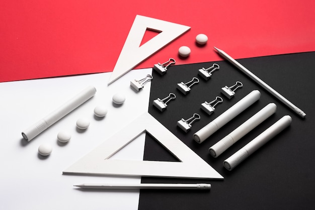 Free photo supplies on white red and black table