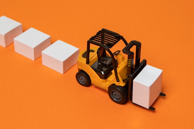 Free Photo supply chain representation with  forklift  high angle