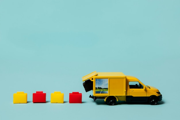 Free Photo supply chain representation with yellow truck