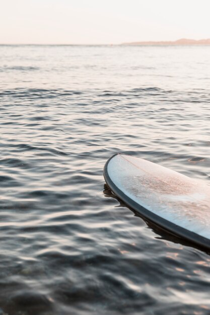 Surfboard floating on sea