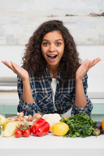 Surprised beautiful woman looking at photographer