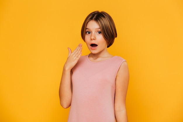 Free photo surprised little lady looking camera isolated