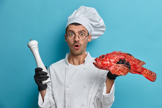 Free Photo surprised professional male chef