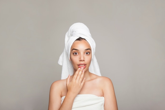 Surprised woman after bath