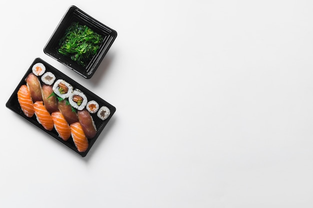 Sushi near seaweed salad