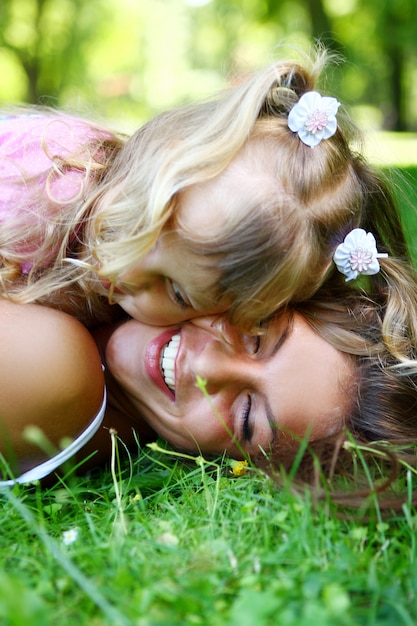 Sweet and beautiful girl with mom