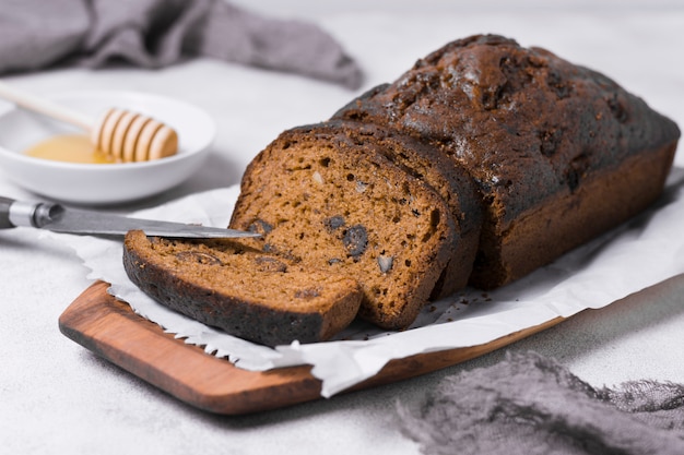 Sweet bread on plate with honey