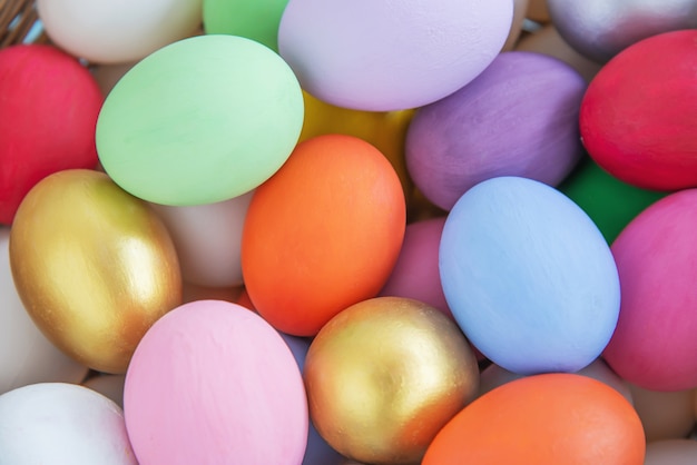 Sweet colorful Easter eggs background - national holiday celebration concepts