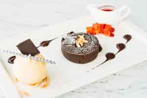 Free photo sweet dessert with chocolate lava cake and ice cream