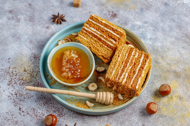 Sweet homemade layered honey cake with spices and nuts.