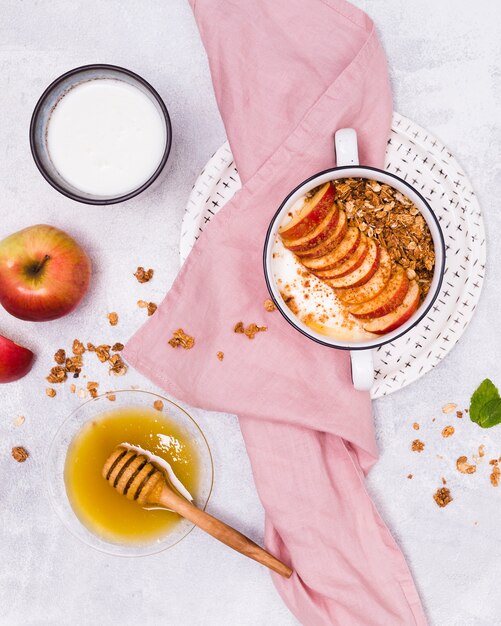 Sweet honey with apple flat lay