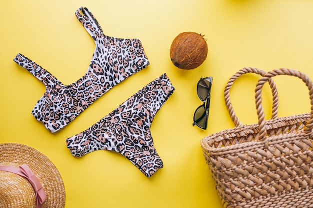 Free photo swimsuit on yellow background isolated