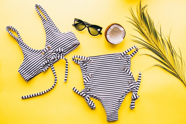 Free Photo swimsuit on yellow background isolated