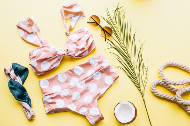 Swimsuit on yellow background isolated