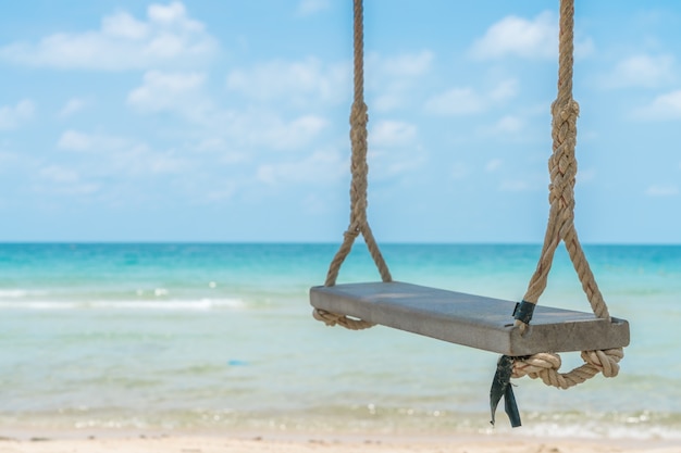 Free photo a swing on the beach