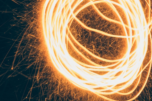 Free photo swirling fire effect on black background