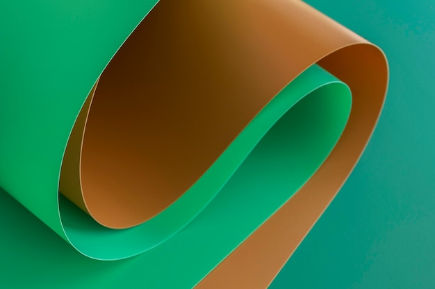 Free photo swirls of brown and green papers