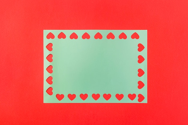 Free photo symbols of heart on blue paper