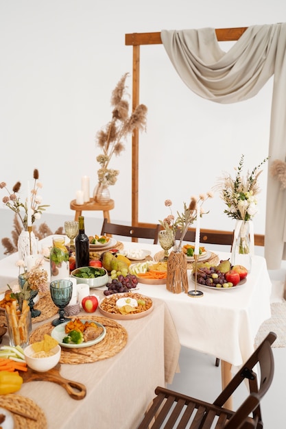 Free Photo table arrangement with food for wedding event