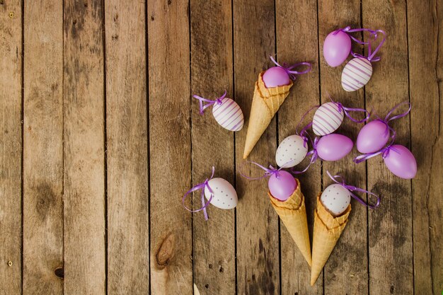 Table background with cones and easter eggs