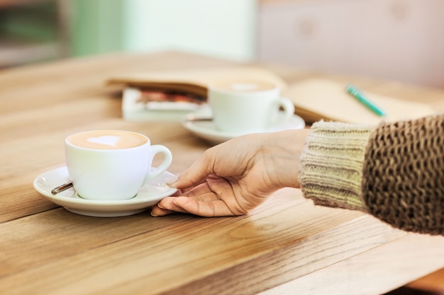 Table setting for coffee on the counter at a coffee house