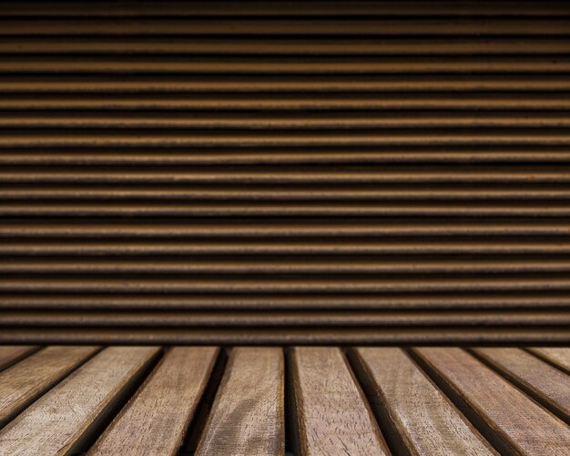 Table surface looking out to brown striped background