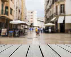 Free photo table surface looking out to city scene