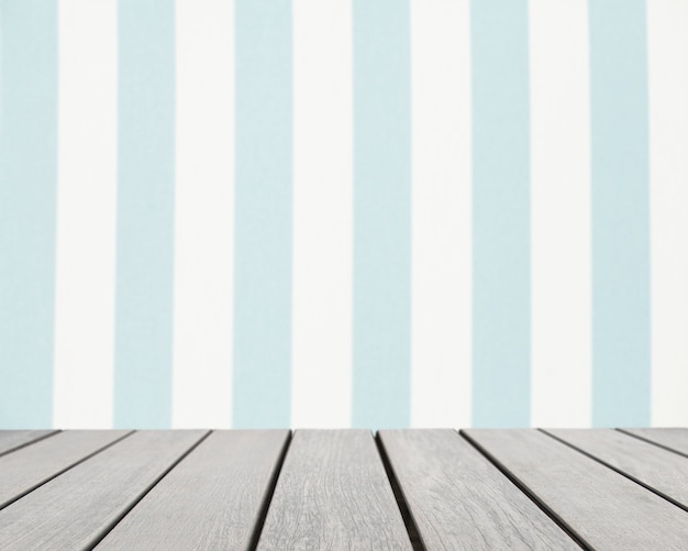 Free Photo table surface looking out to white and blue stripes