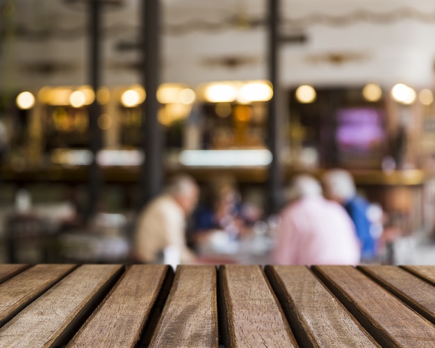 Table texture looking out to men in bar