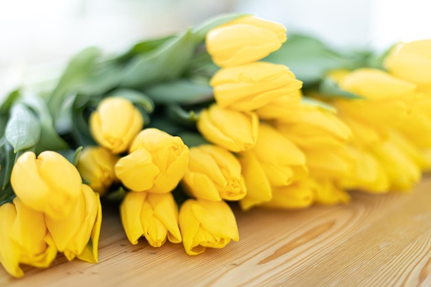 Table with a fresh bouquet of tulips