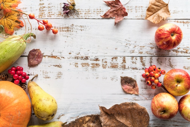 Free Photo table with harvest of berries and fruits