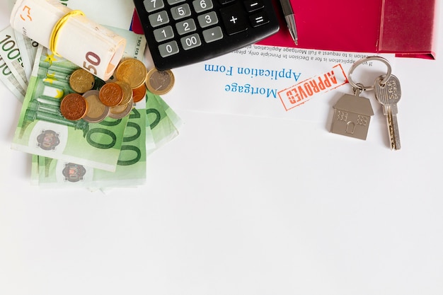 Table with money and mortgage papers