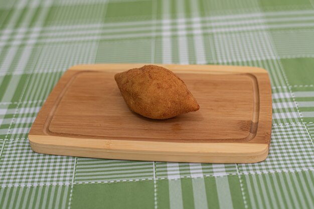 Table with several Brazilian snacks