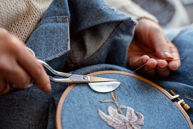 Tailor creating a beautiful decoration close-up