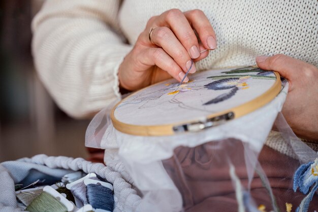 Tailor making a home decoration close-up