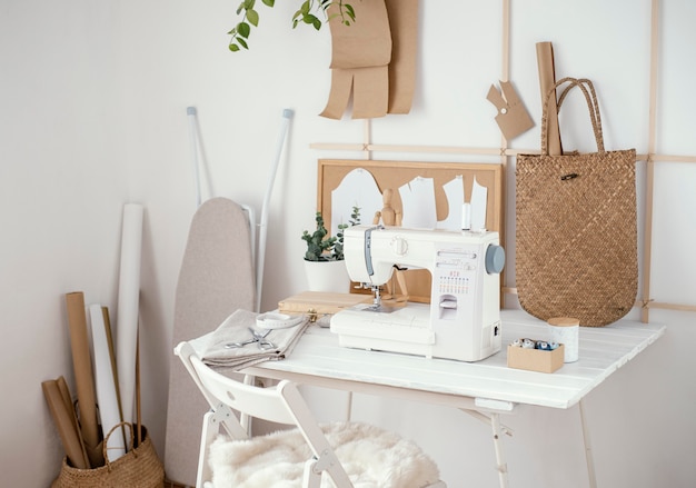 Free photo tailoring studio with sewing machine on the table