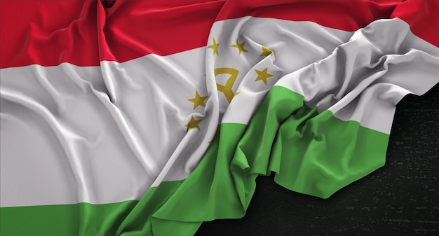 Tajikistan Flag Wrinkled On Dark Background 3D Render