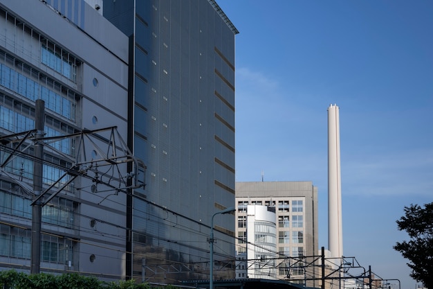 Free photo tall chimney in urban area