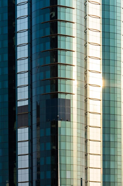 Tall and colorful skycrapers with beautiful blue sky in background.