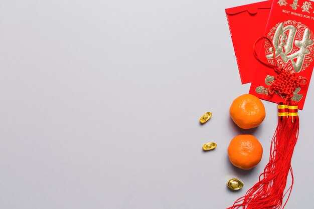 Tangerines near Chinese decorations